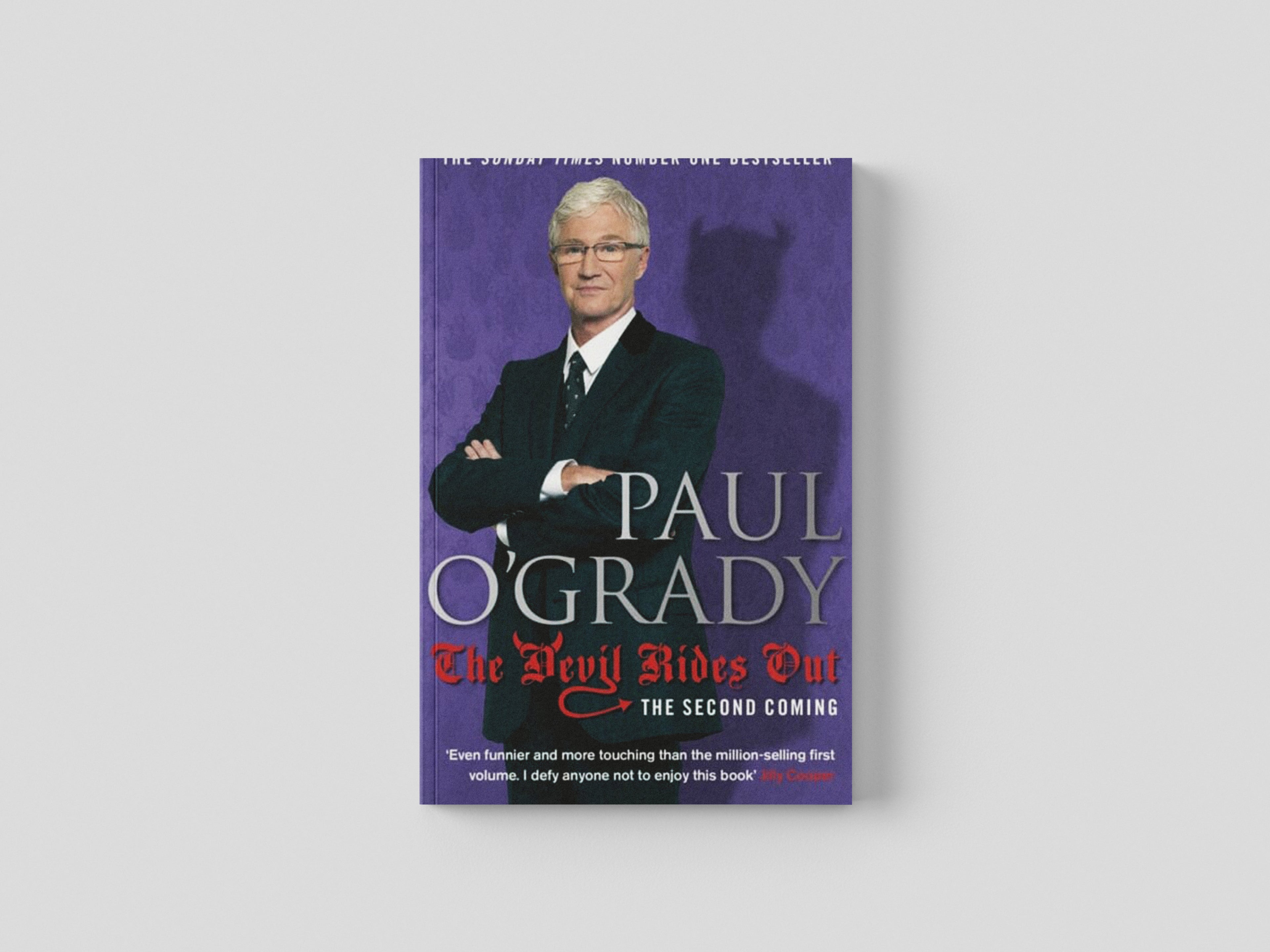 The Devil Rides Out by Paul O'Grady; 9780553824636