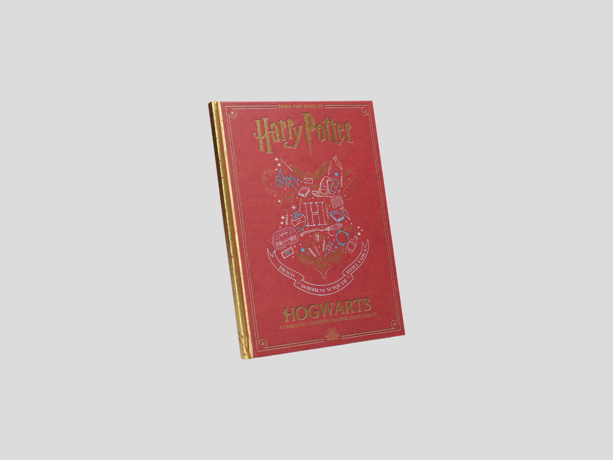 Harry Potter Hogwarts: A Cinematic Yearbook 20th Anniversary Edition - Ages 7-11 by Scholastic; 9780702311468