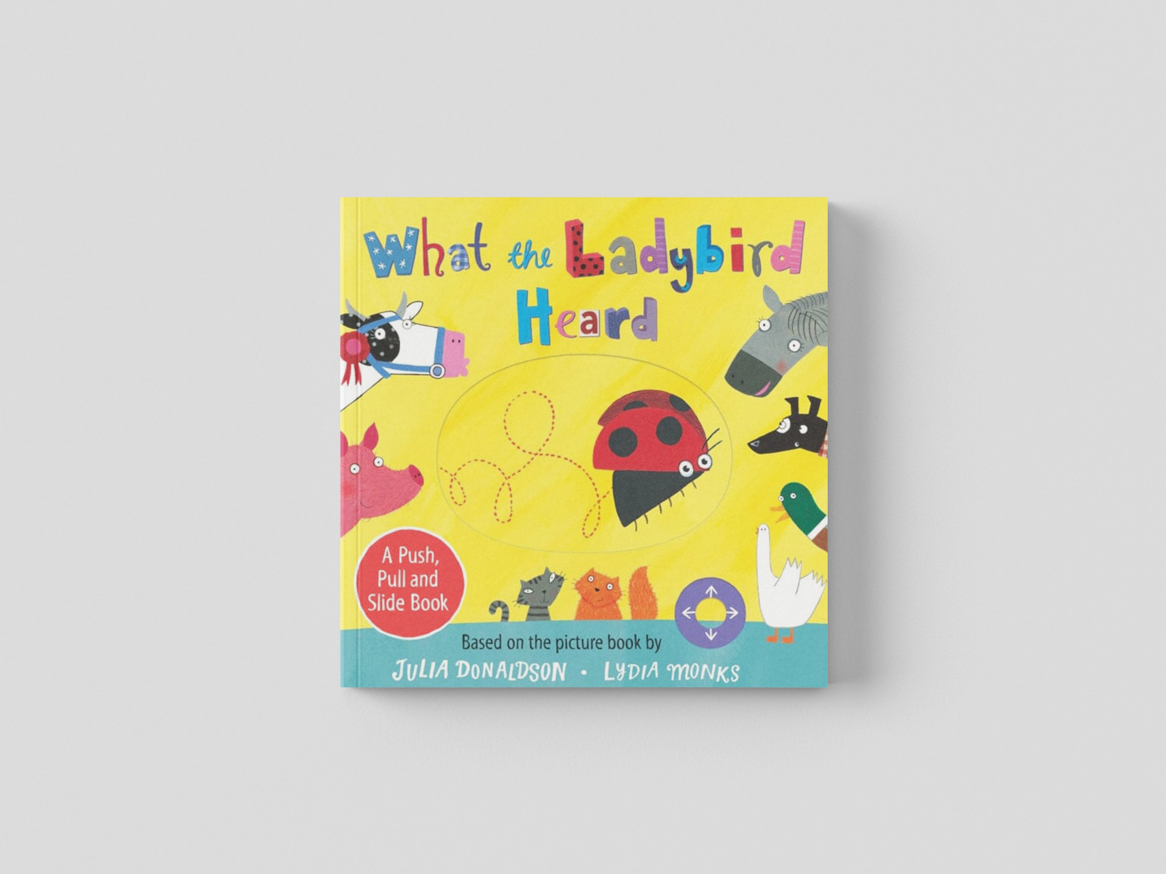 What the Ladybird Heard: A Push, Pull and Slide Board Book by Pan Macmillan; 9781529072532